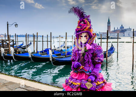 Venice, Italy. Carnival of Venice, beautiful mask at St. Mark`s Square. Stock Photo